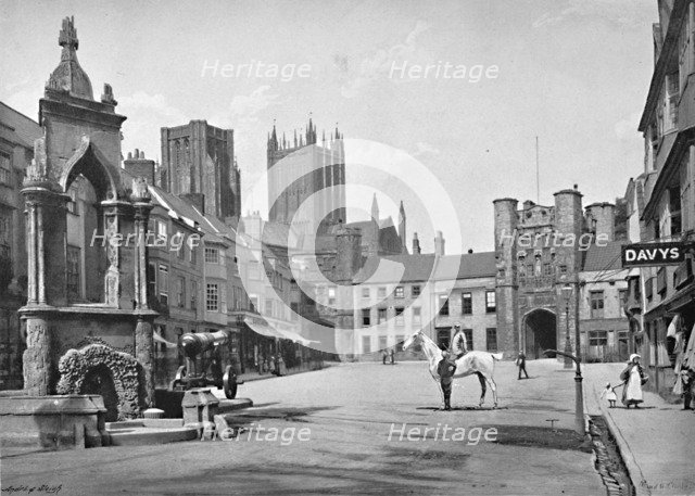 'Market Place and Cathedral Towers, Wells', c1896. Artist: Thomas W Phillips.