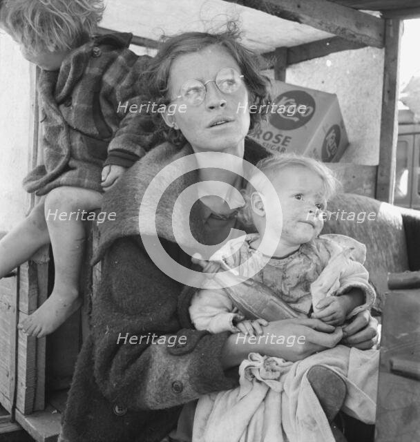 Family, one month from South Dakota, now on the road..., Tulelake, Siskiyou County, California, 1939 Creator: Dorothea Lange.