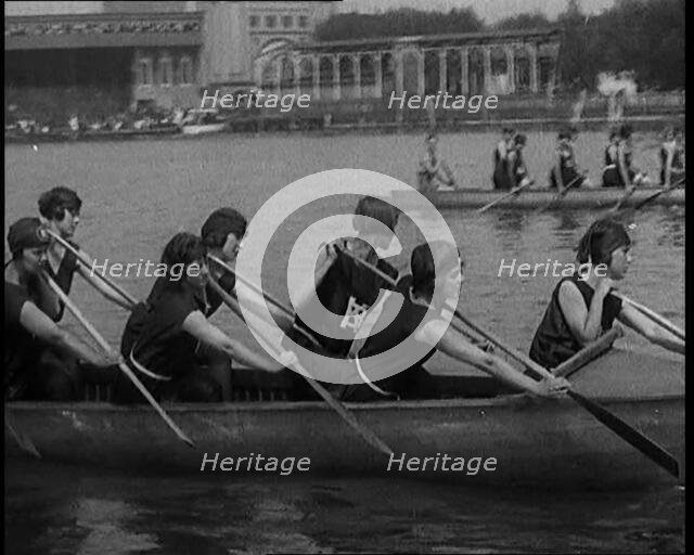 Young Female Civilians Wearing a Team Sport Outfit in a Rowing Race, an Audience Is Seen on..., 1920 Creator: British Pathe Ltd.