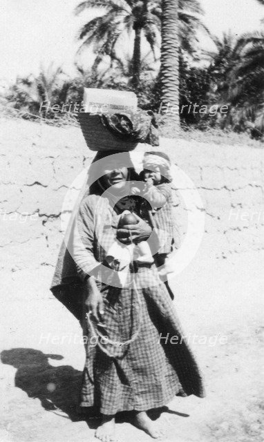 Arab woman and child, 1917-1919. Artist: Unknown