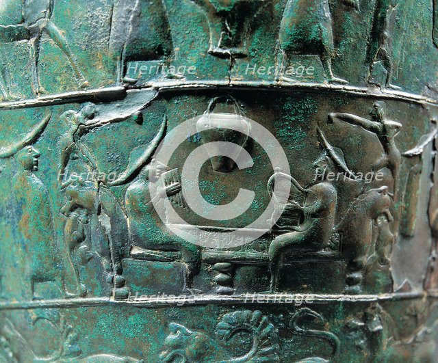 Scene from a situla in bronze of the Certusa of Bologna with a character playing the harp and ano…