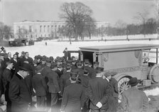 U.S. Capitol - Visitors, Etc., Casket Being Placed In Hearse, 1914. Creator: Harris & Ewing.