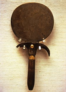 Bronze Mirror with a papyrus handle.