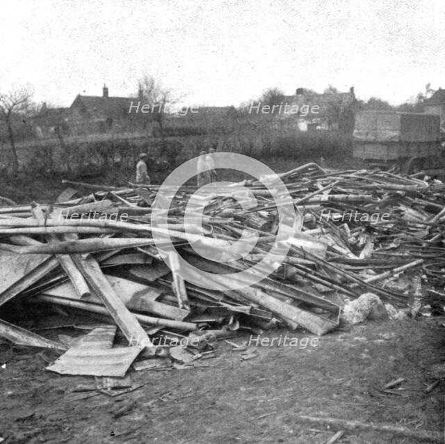 'Le Royaume de la Mort'; Gouttieres et feuilles de zinc que les allemands avaient amasses et qu'ils  Creator: Unknown.