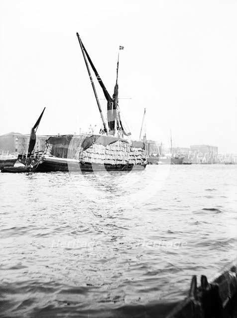 Topsail barge on the Thames with its top mast lowered, London, c1905. Artist: Unknown