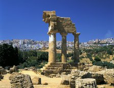 Temple of Diosuri, Agrigento, Sicily, Italy. Agrigento town behind.