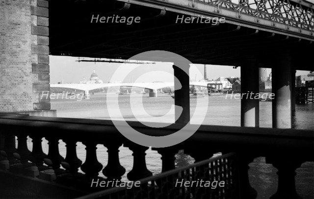 The River Thames and Hungerford Railway Bridge, London, c1945-c1965. Artist: SW Rawlings