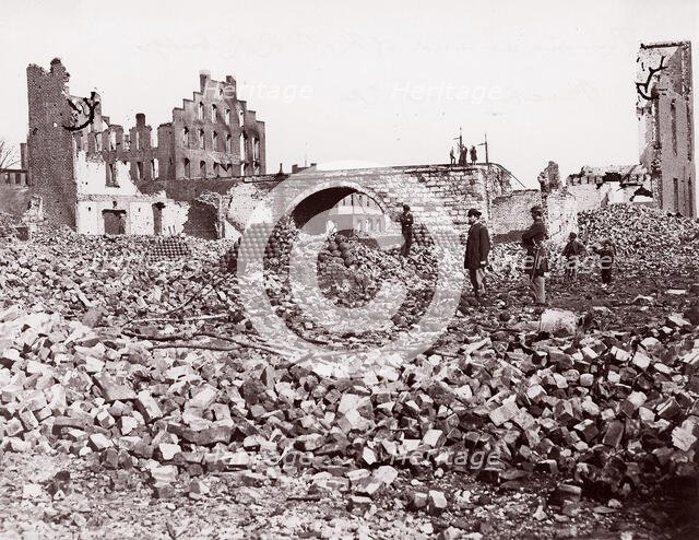 Ruins at end of Richmond and Petersburg Railroad Bridge, Richmond, 1861-65. Creator: Alexander Gardner.