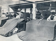 The Making of khaki: examining the finished cloth, c1914.