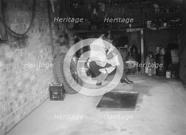 FA Thatcher in his garage. Artist: Bill Brunell.