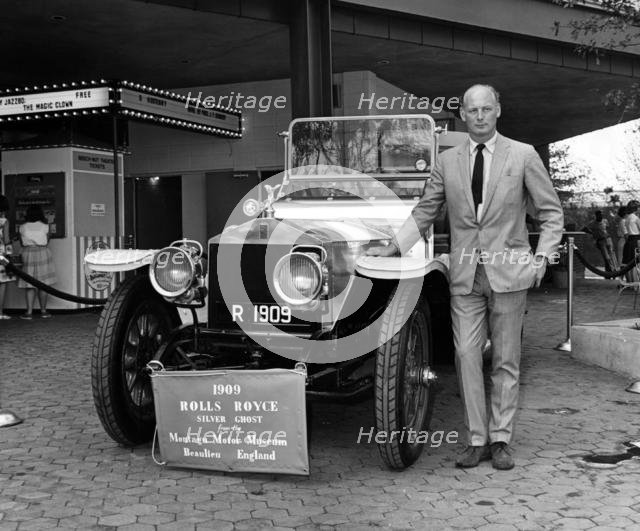 Lord Montagu with 1909 Rolls - Royce Silver Ghost at 1964 World's Fair, New York. Creator: Unknown.