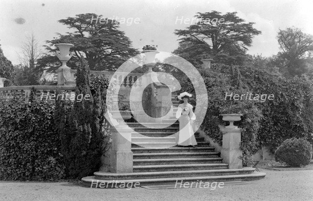 Woman posing at Park Place, Remenham, Berkshire, c1900. Artist: Farnham Maxwell Lyte