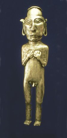 Empty anthropomorphic figure made of silver representing a male person with his arms across his c…