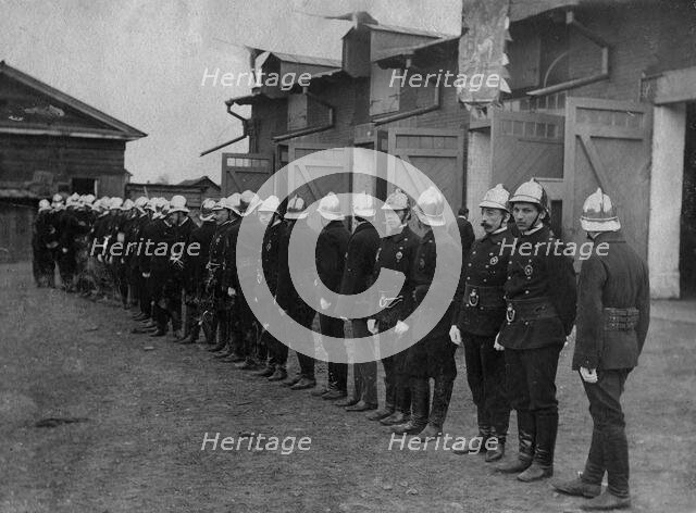 The fire brigade of the voluntary fire society near its building on Arsenalnaya Street, 1908. Creator: Unknown.