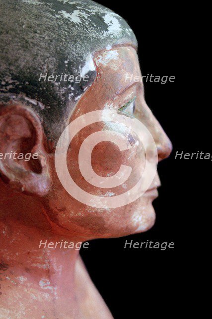 Close up of an Egyptian seated scribe model. Artist: Unknown