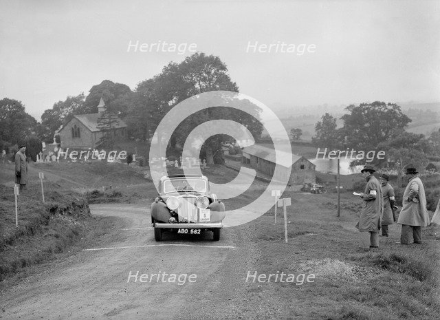 Jaguar SS saloon of SG Davies competing in the South Wales Auto Club Welsh Rally, 1937 Artist: Bill Brunell.
