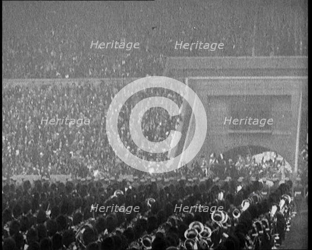 Crowds Cheer as King George V and Queen Mary of The United Kingdom Enter of the Wembley..., 1924. Creator: British Pathe Ltd.