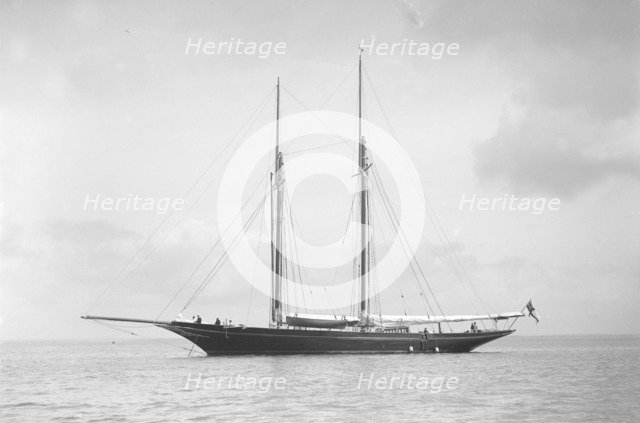 The schooner 'Allah Karim' at anchor, 1912. Creator: Kirk & Sons of Cowes.