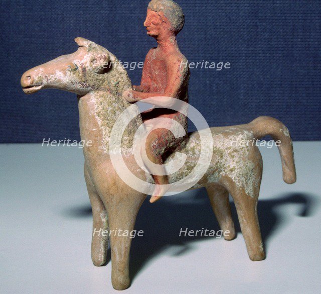 Greek terracotta statuette of a horse and rider, 6th century BC.