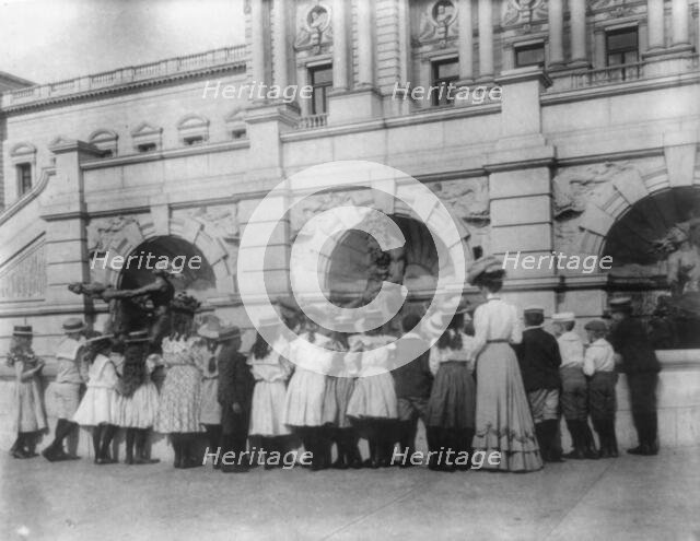 A class of the 2nd Division at the fountain in front of the Library of Congress, (1899?). Creator: Frances Benjamin Johnston.