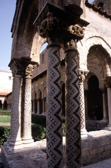 Detail of inlaid mosaic arches of the Monreale Cathedral cloister in Sicily, Norman-Byzantine sty…
