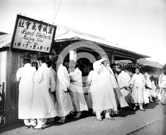 Queing for railway tickets, Seoul, Korea, 1900. Artist: Unknown