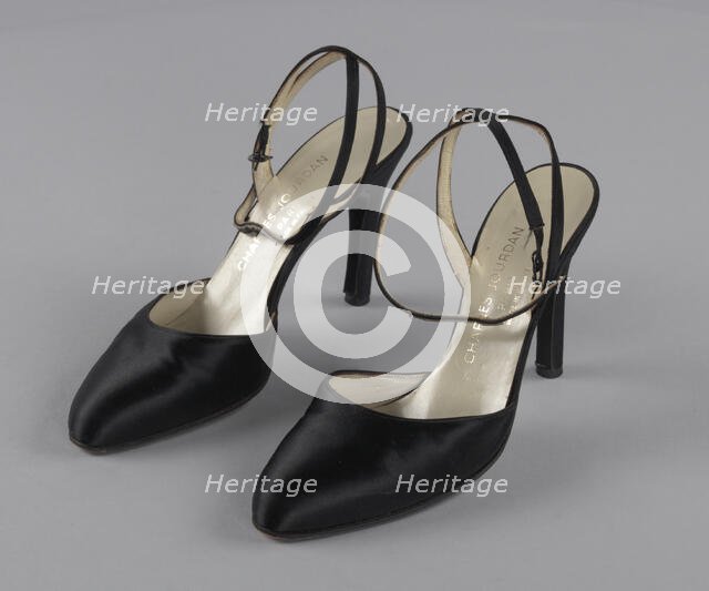 Pair of black stiletto heel shoes by Charles Jourdan from Mae's Millinery Shop, 1941-1994. Creator: Charles Jourdan.