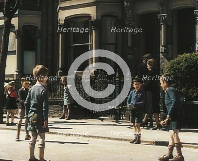 Children Playing in the Street, 1942. Creator: British Pathe Ltd.