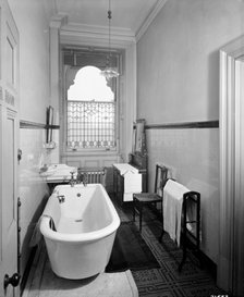 An early bathroom in the Grand Hotel, Northumberland Avenue, London, 1912.  Artist: Bedford Lemere and Company