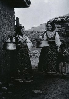 Two Bulgarian women with a child wearing national dress, c1900. Creator: Unknown.