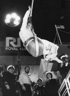 Margaret Thatcher trying out a jackstay after opening the Boat Show, Earl's Court, 4th January 1979. Artist: Unknown