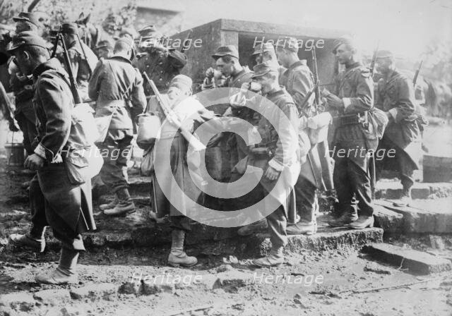 French troops drinking water on march, between c1914 and c1915. Creator: Bain News Service.