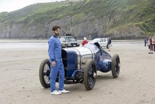 1925 Sunbeam 350 hp at Pendine Sands 2015 with model in costume. Creator: Unknown.
