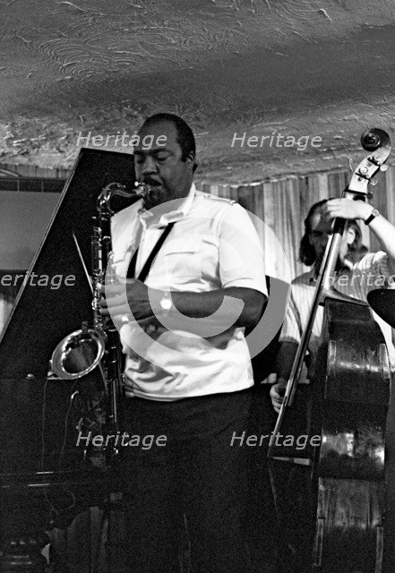 Nathan Davis and Peter Ind, Bass Clef, Hoxton Square, London, August 1987.   Artist: Brian O'Connor.