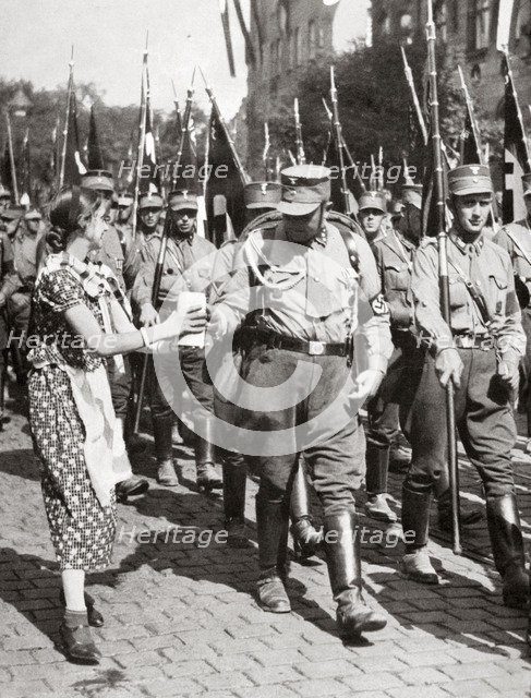 'A Fresh Drink from a Tender Hand Tastes Twice as Good', c1933 (1938). Artist: Unknown