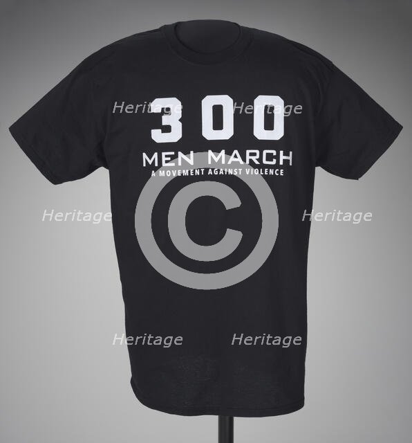 Black t-shirt for 300 Men March worn at a rally after the death of Freddie Gray, 2015. Creator: Gildan Activewear Inc..