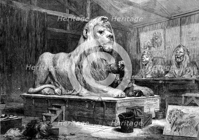 Sir Edwin Landseer modelling the lions for Trafalgar-square, 1873. Creator: Unknown.