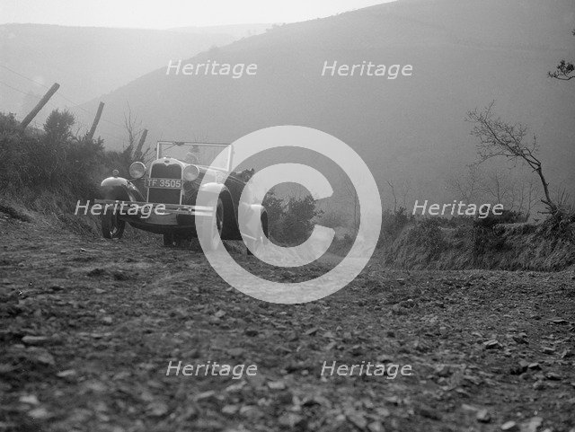 Kitty Brunell driving a 1930 2-seater Ford Model A, 1931.   Artist: Bill Brunell.