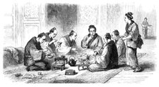 Japanese party at meals - from a sketch by our special artist, 1864. Creator: Unknown.
