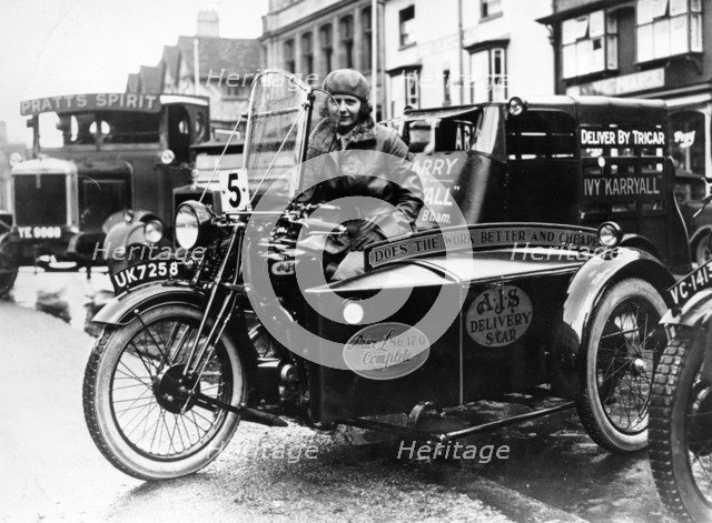 Woman riding a 1929 500cc AJS motorbike, (c1929?). Artist: Unknown