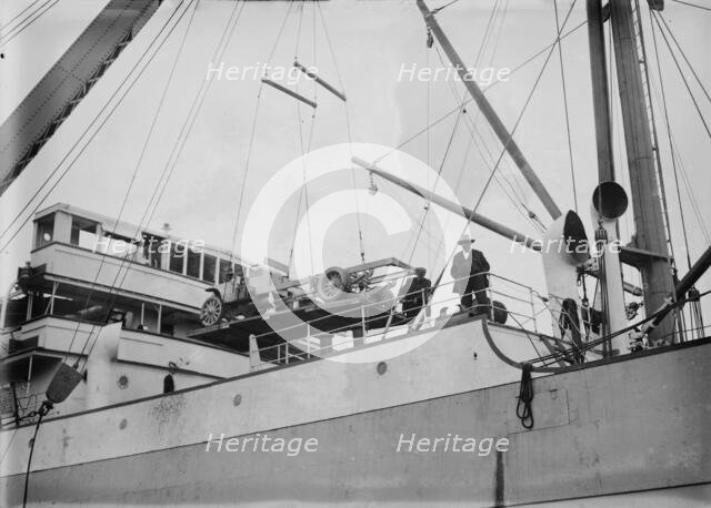 Loading war auto. on Sugura [i.e., Loading a truck chassis on the Suruga], between c1914 and c1915. Creator: Bain News Service.