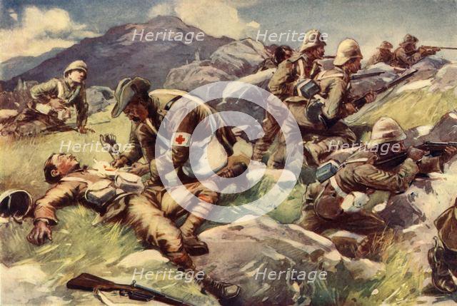 'A Non-Combatant Hero - An Army Doctor at Work in the Firing Line', 1902. Creator: Unknown.
