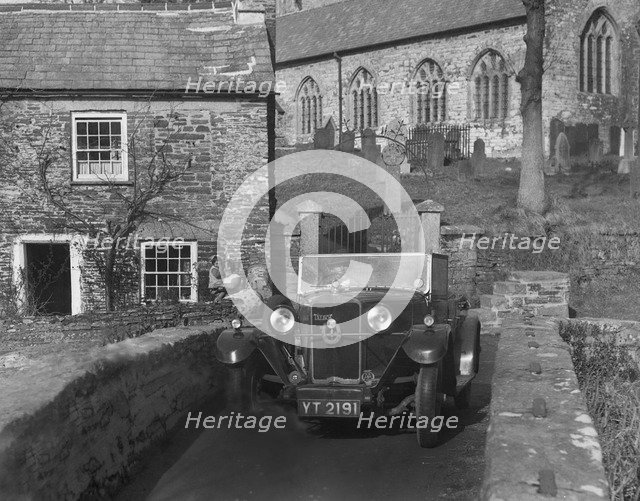 Talbot 14/45 tourer on the packhorse bridge, Altarnun, Cornwall, c1930. Artist: Bill Brunell.