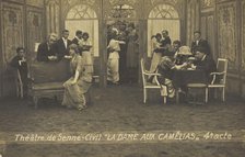 French or Belgian prisoners of war, some in drag, posing on stage during a crowded scene..., (1918?) Creator: Unknown.