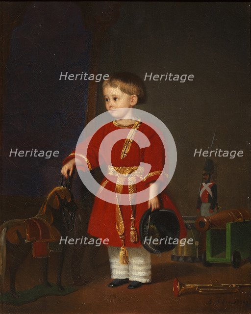 Portrait of a boy in a red dress with military toys.