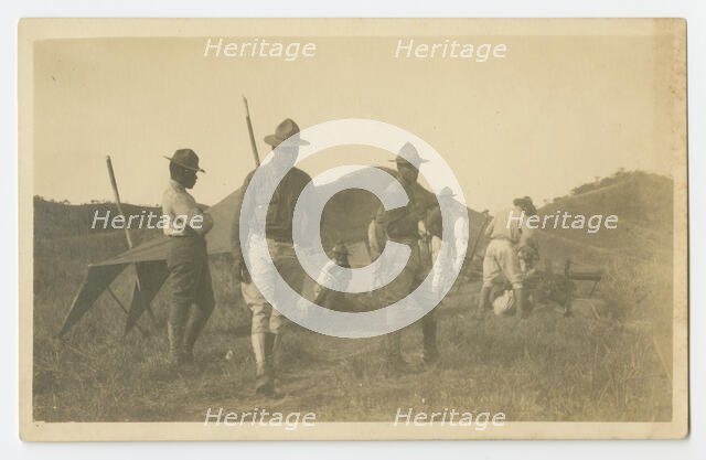 Photographic postcard of Charles Wilbur Rogan with his unit in the Philippines, 1910-1919. Creator: Unknown.
