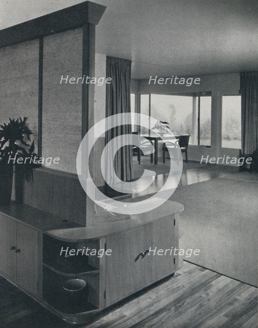 'House at Pomona, California...looking across the living room', 1942.  Artist: Unknown.