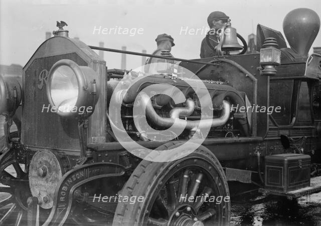 Under the hood of the motor fire engine, 1913. Creator: Bain News Service.