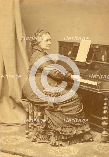 Portrait of Clara Wieck-Schumann (1819-1896) at the piano, ca 1878. Creator: Hanfstaengl, Franz (1804-1877).