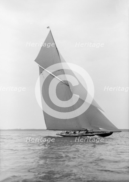 The 15 Metre class 'Pamela' sailing close-hauled, 1913. Creator: Kirk & Sons of Cowes.
